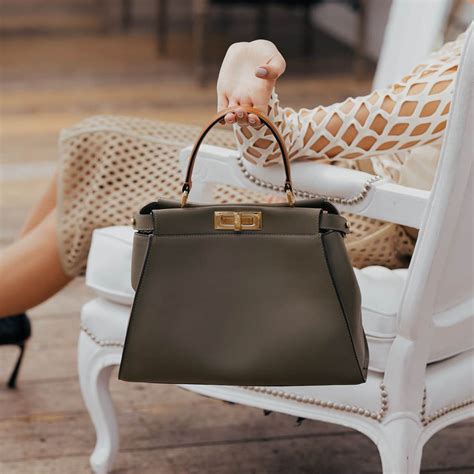 giubotto fendi neontao|Shop the Fendi Peekaboo Bag for Women .